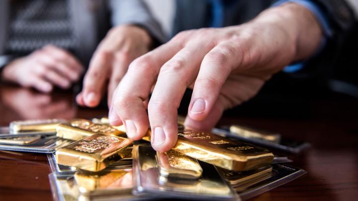 Gold prices hold steadfast in light of dollar strength and higher U.S. Treasury yields