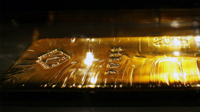 Gold closes fractionally higher as the Dow approaches 30,000